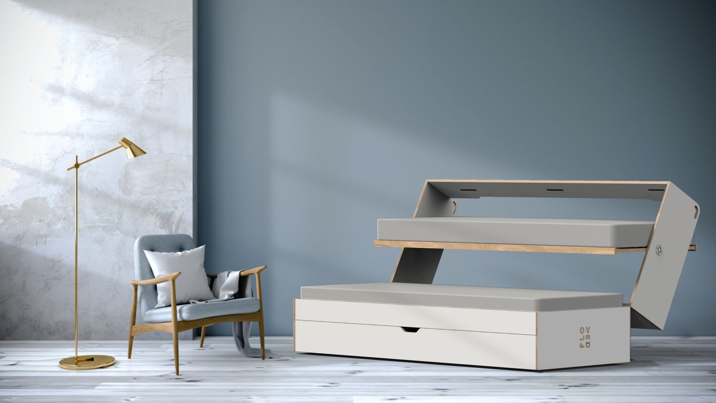 The FLOVED sofa bed is half open